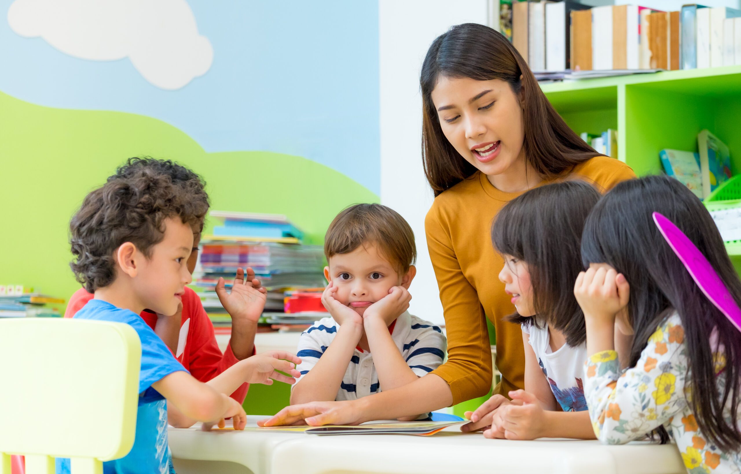 Kids Reading Book in Classroom